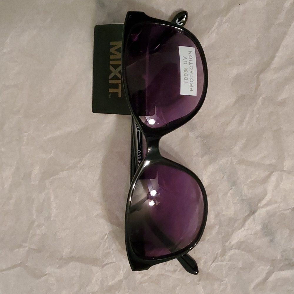 Woman's sunglasses.  Black with gold accents.  NWT
